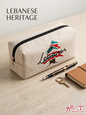 Embroidered canvas pouch featuring the Cedar of Lebanon with a fountain pen and notebook