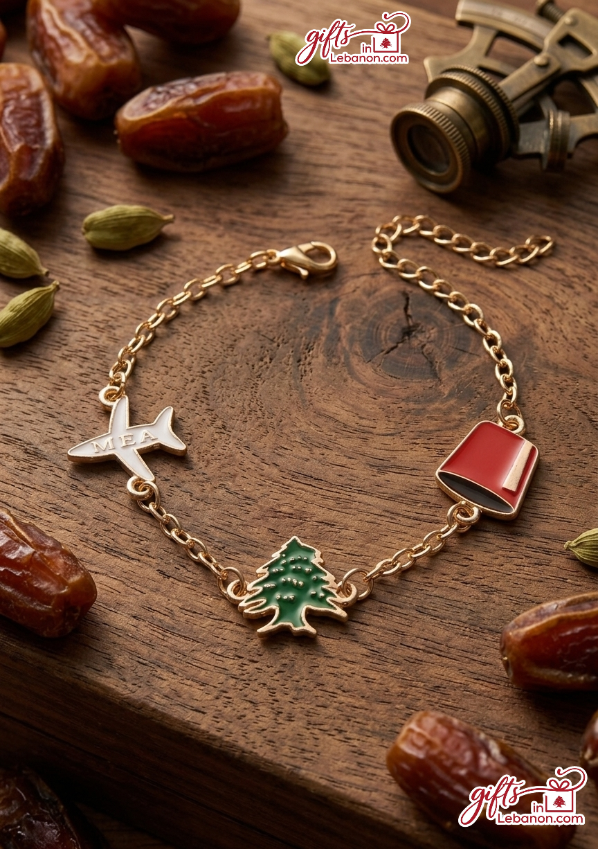 Gold-toned Lebanese charm bracelet with MEA plane, Cedar tree, and Tarboush charms